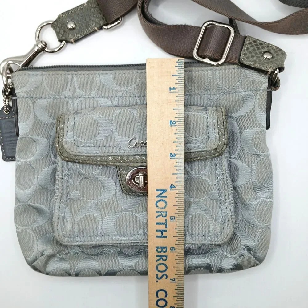 Coach Penelope Signature Turn-Lock Crossbody Bag in Silver With Lavender Lining